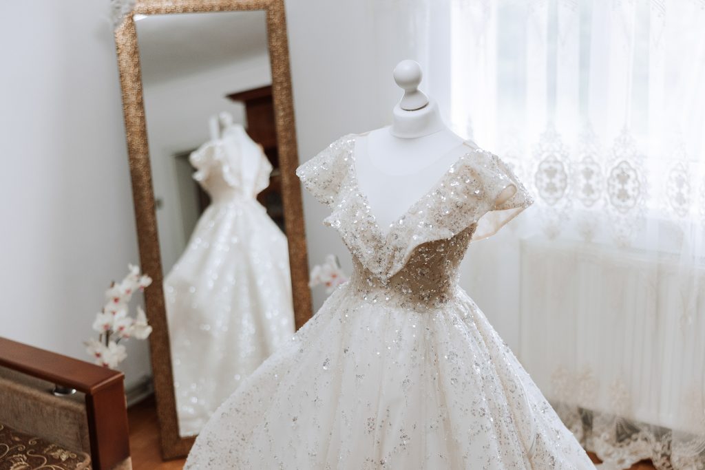 bedroom interior with wedding dress prepared ceremony beautiful lush wedding dress mannequin hotel room